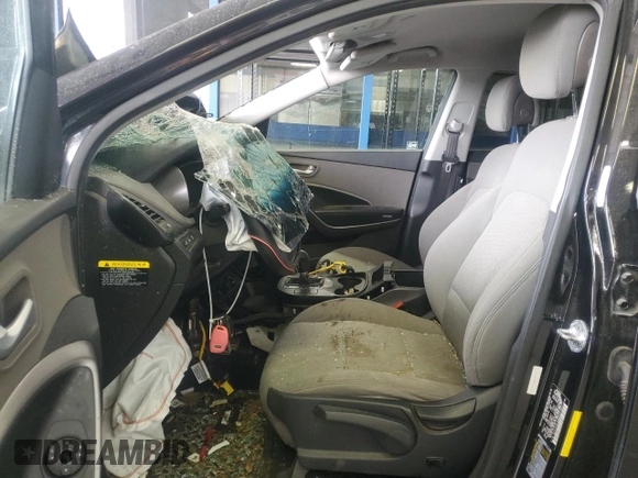 2016 Hyundai Santa Fe z VIN 5XYZT3LB8GG337601, wystawiony jako Copart lot #56130385 z przebiegiem Nie podano mil oraz Szkoda całkowita • Salvage title. Historia ofert i sprzedaży dostępna na DreamBid. Obrazek 7.