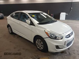 2015 Hyundai Accent GLS with VIN KMHCT4AE8FU876771, listed as a IAAI auction lot 42007229 with 63,484 mi miles. Bid and sale history available at carsss.com. Image 1.