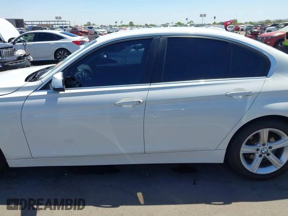 2015 BMW 3 Series 328i with VIN WBA3C1C52FK117753, listed as a IAAI auction lot 42270013 with 147,386 mi miles and . Bid and sale history available at DreamBid. Image 14.