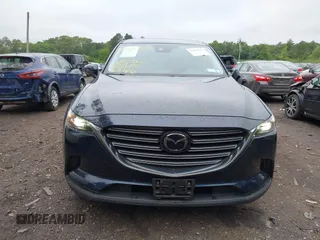 2019 Mazda CX-9 Touring with VIN JM3TCBCY6K0334898, listed as a IAAI auction lot 42467677 with 69,454 mi miles and . Bid and sale history available at DreamBid. Image 12.