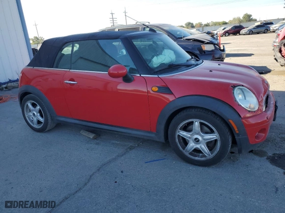 2009 MINI Cooper Convertible with VIN WMWMR33579TU96438, listed as a Copart auction lot 73787644 with 124,408 mi miles and Salvage Title. Bid and sale history available at carsss.com. Image 4.