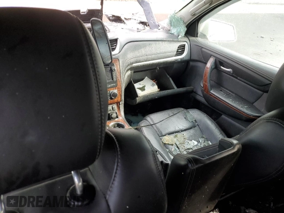 2014 Chevrolet Traverse LTZ z VIN 1GNKVJKD9EJ231164, wystawiony jako Copart lot #52876665 z przebiegiem Nie podano mil oraz Szkoda całkowita • Salvage title. Historia ofert i sprzedaży dostępna na DreamBid. Obrazek 8.