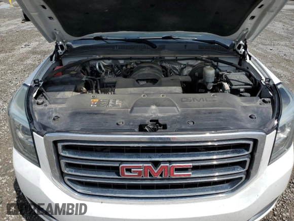 2016 GMC Yukon SLT z VIN 1GKS2BKC6GR343640, wystawiony jako Copart lot #55472325 z przebiegiem 217 065 mil mil oraz Szkoda całkowita • Salvage title. Historia ofert i sprzedaży dostępna na DreamBid. Obrazek 12.