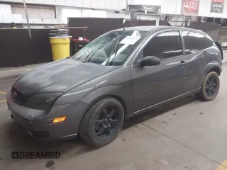 2007 Ford Focus S with VIN 1FAFP31NX7W327732, listed as a IAAI auction lot 41892875 with 155,820 mi miles and . Bid and sale history available at carsss.com. Image 2.