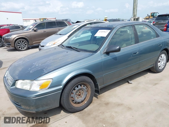 2001 Toyota Camry CE z VIN JT2BG22K310536515, wystawiony jako IAAI lot #42409847 z przebiegiem 205 978 mil mil oraz . Historia ofert i sprzedaży dostępna na DreamBid. Obrazek 2.