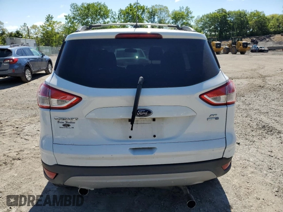 2013 Ford Escape SE z VIN 1FMCU9G99DUC73121, wystawiony jako Copart lot #57966605 z przebiegiem 169 764 mil mil oraz Szkoda całkowita • Salvage title. Historia ofert i sprzedaży dostępna na DreamBid. Obrazek 6.