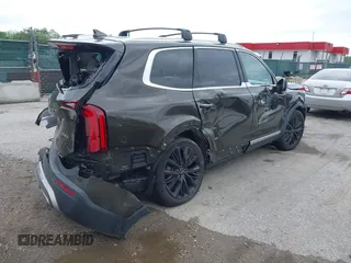 2020 Kia Telluride SX with VIN 5XYP5DHC8LG079664, listed as a IAAI auction lot 42222352 with 98,348 mi miles and . Bid and sale history available at DreamBid. Image 4.