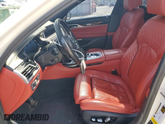 2018 BMW 7 Series M760i xDrive with VIN WBA7H6C53JG614967, listed as a Copart auction lot 49269345 with 83,872 mi miles and Salvage Title. Bid and sale history available at carsss.com. Image 7.