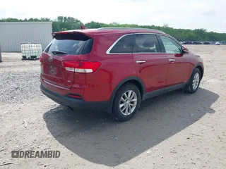 2018 Kia Sorento LX z VIN 5XYPGDA38JG421230, wystawiony jako IAAI lot #42213497 z przebiegiem 146 000 mil mil oraz . Historia ofert i sprzedaży dostępna na DreamBid. Obrazek 4.