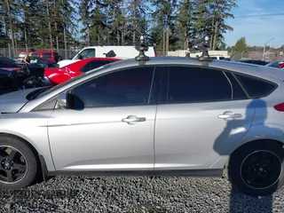 2014 Ford Focus SE z VIN 1FADP3K24EL399942, wystawiony jako IAAI lot #41697216 z przebiegiem 112 393 mil mil oraz . Historia ofert i sprzedaży dostępna na DreamBid. Obrazek 15.