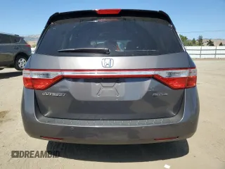2012 Honda Odyssey Touring с VIN 5FNRL5H9XCB116455, выставлен на аукционе Copart как лот 60880835 с пробегом 96 672 миль миль и Списание • Salvage title. История ставок и продаж доступна на DreamBid. Изображение 6.
