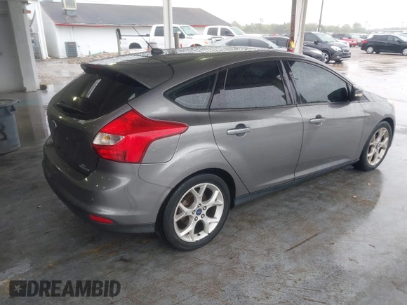 2014 Ford Focus SE with VIN 1FADP3K28EL167909, listed as a IAAI auction lot 41747128 with 239,780 mi miles. Bid and sale history available at carsss.com. Image 4.