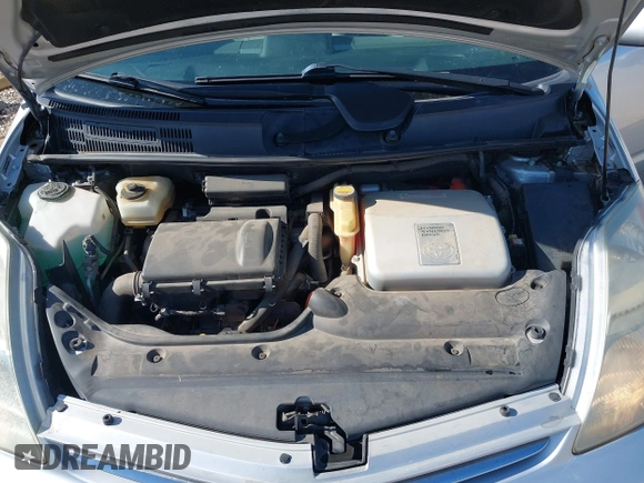 2007 Toyota Prius with VIN JTDKB20UX77658668, listed as a IAAI auction lot 42293558 with 123,007 mi miles and . Bid and sale history available at DreamBid. Image 10.