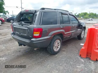 2002 Jeep Grand Cherokee Limited with VIN 1J8GW58N22C173250, listed as a IAAI auction lot 42480524 with 162,341 mi miles and . Bid and sale history available at DreamBid. Image 4.