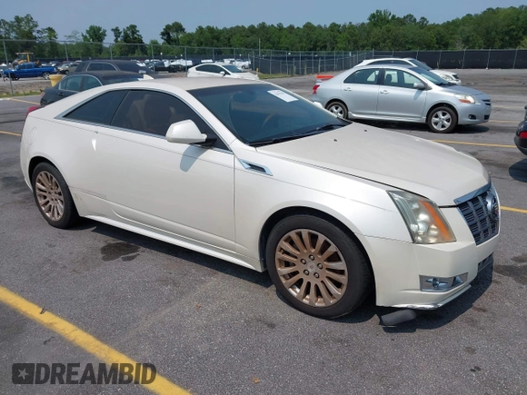 2012 Cadillac CTS Premium z VIN 1G6DP1E3XC0108543, wystawiony jako IAAI lot #42413547 z przebiegiem 80 570 mil mil oraz . Historia ofert i sprzedaży dostępna na DreamBid. Obrazek 1.