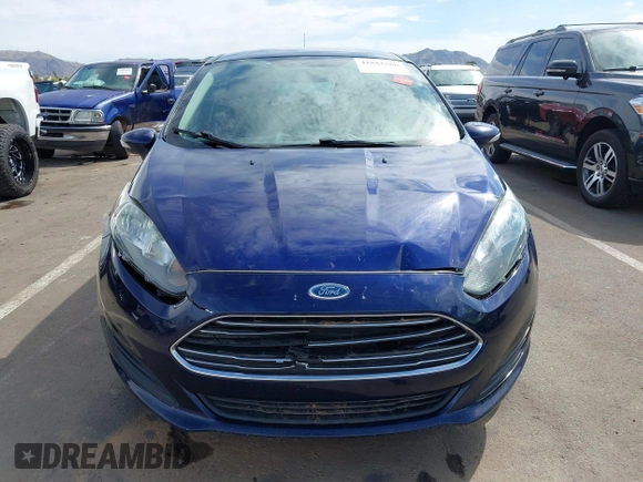 2016 Ford Fiesta SE with VIN 3FADP4EJ4GM199945, listed as a IAAI auction lot 41881260 with 98,945 mi miles. Bid and sale history available at carsss.com. Image 12.