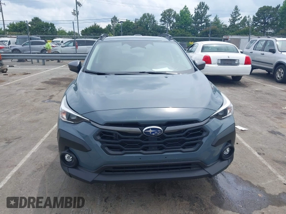 2024 Subaru Crosstrek Premium z VIN JF2GUADC7R8299418, wystawiony jako IAAI lot #42358005 z przebiegiem 21 690 mil mil oraz . Historia ofert i sprzedaży dostępna na DreamBid. Obrazek 12.