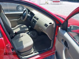 2007 Ford Focus S with VIN 1FAFP34NX7W270752, listed as a IAAI auction lot 42452121 with 208,470 mi miles and . Bid and sale history available at DreamBid. Image 5.