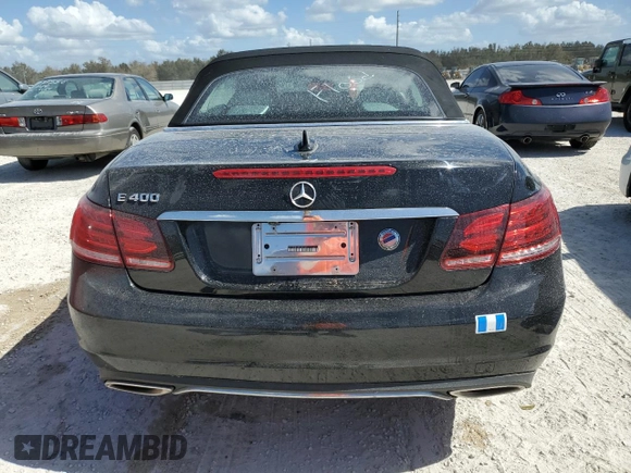 2015 Mercedes-Benz E 400 with VIN WDDKK6FFXFF301128, listed as a Copart auction lot 76691954 with 49,313 mi miles and Salvage title. Bid and sale history available at DreamBid. Image 6.