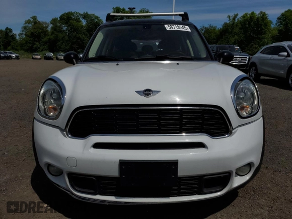 2014 MINI Countryman S z VIN WMWZC5C51EWP35221, wystawiony jako Copart lot #58718545 z przebiegiem 152 809 mil mil oraz Tytuł czysty. Historia ofert i sprzedaży dostępna na DreamBid. Obrazek 5.