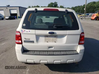 2010 Ford Escape XLS with VIN 1FMCU0C76AKB82752, listed as a Copart auction lot 57626565 with 194,931 mi miles and Salvage title. Bid and sale history available at DreamBid. Image 6.