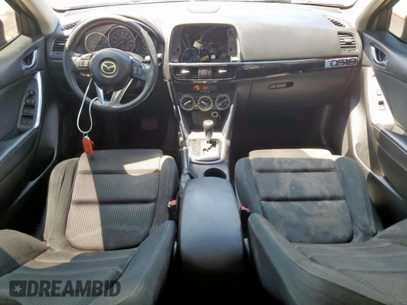 2014 Mazda CX-5 Touring with VIN JM3KE2CY5E0316077, listed as a Copart auction lot 58218735 with 190,789 mi miles and Salvage title. Bid and sale history available at DreamBid. Image 8.