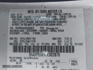 2012 Ford Fusion SEL with VIN 3FAHP0JA5CR302870, listed as a IAAI auction lot 41604323 with 210,240 mi miles. Bid and sale history available at carsss.com. Image 9.