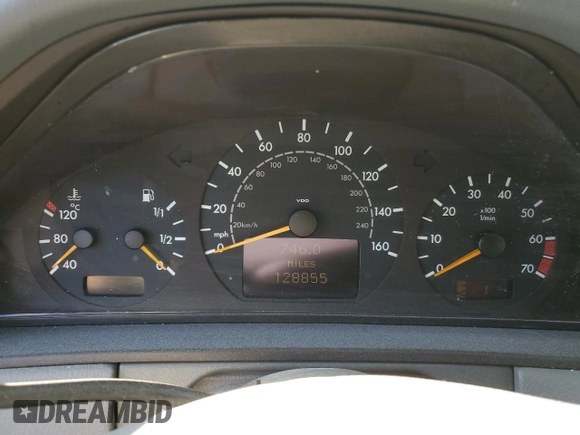 2002 Mercedes-Benz E-Class with VIN WDBJF65J32B496411, listed as a Copart auction lot 75690884 with 128,855 mi miles and Salvage Title. Bid and sale history available at carsss.com. Image 9.