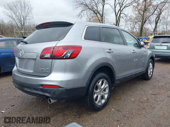 2014 Mazda CX-9 Touring with VIN JM3TB3CA8E0437272, listed as a IAAI auction lot 40833160 with 153,267 mi miles. Bid and sale history available at carsss.com. Image 4.