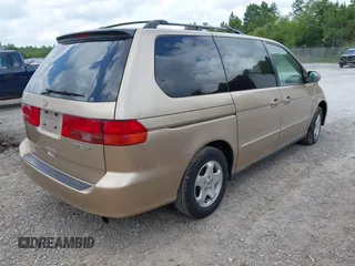 2001 Honda Odyssey EX z VIN 2HKRL18631H601677, wystawiony jako IAAI lot #42270829 z przebiegiem 205 706 mil mil oraz . Historia ofert i sprzedaży dostępna na DreamBid. Obrazek 4.