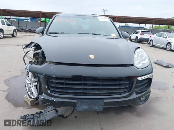 2016 Porsche Cayenne z VIN WP1AA2A29GLA00762, wystawiony jako IAAI lot #41963152 z przebiegiem 60 503 mil mil oraz . Historia ofert i sprzedaży dostępna na DreamBid. Obrazek 13.