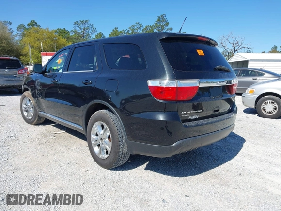 2013 Dodge Durango SXT with VIN 1C4RDJAG2DC617983, listed as a IAAI auction lot 41805992 with 210,560 mi miles and . Bid and sale history available at carsss.com. Image 3.