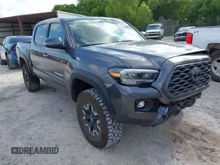 2020 Toyota Tacoma SR5 with VIN 3TYCZ5AN5LT003864, listed as a IAAI auction lot 42145951 with 40,451 mi miles and . Bid and sale history available at DreamBid. Image 1.