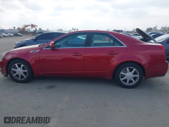 2009 Cadillac CTS AWD w/1SA with VIN 1G6DG577990113572, listed as a IAAI auction lot 42110784 with 229,692 mi miles. Bid and sale history available at carsss.com. Image 14.
