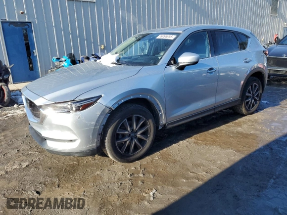 2017 Mazda CX-5 Grand Touring with VIN JM3KFBDL0H0210365, listed as a Copart auction lot 89096995 with 52,549 mi miles and Salvage Title. Bid and sale history available at carsss.com. Image 1.
