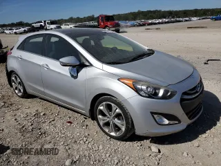 2013 Hyundai Elantra GT w/Blue Int with VIN KMHD35LE8DU048353, listed as a Copart auction lot 73672804 with 79,479 mi miles and Salvage Title. Bid and sale history available at carsss.com. Image 4.