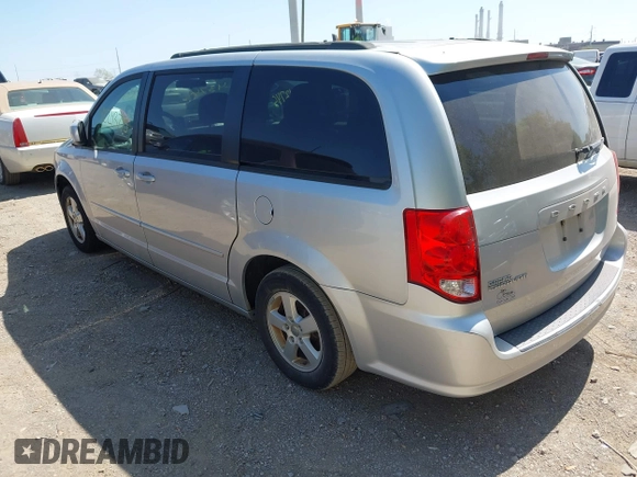 2012 Dodge Grand Caravan SXT with VIN 2C4RDGCG8CR139963, listed as a IAAI auction lot 42243745 with 185,730 mi miles and . Bid and sale history available at DreamBid. Image 3.