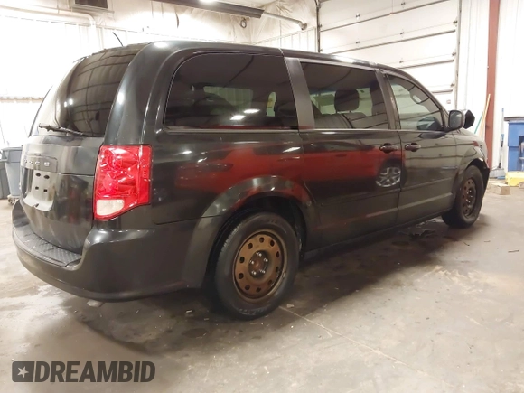 2015 Dodge Grand Caravan SXT with VIN 2C4RDGCG8FR518739, listed as a IAAI auction lot 41704911 with 278,478 mi miles and . Bid and sale history available at DreamBid. Image 4.