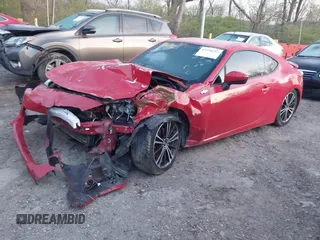 2014 Scion FR-S with VIN JF1ZNAA12E9707566, listed as a IAAI auction lot 41990282 with 105,376 mi miles and . Bid and sale history available at DreamBid. Image 2.