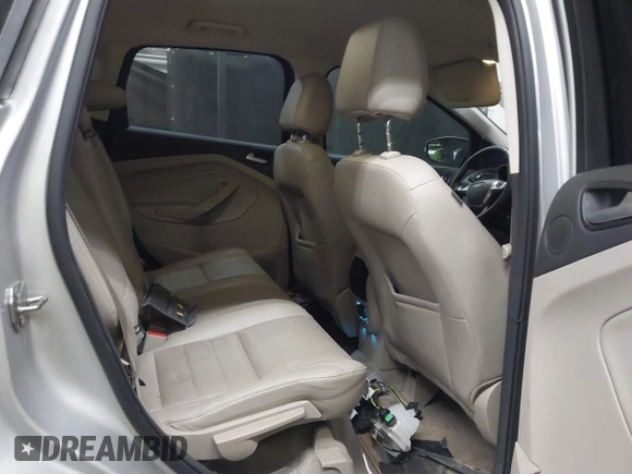 2015 Ford Escape Titanium with VIN 1FMCU0J96FUB81598, listed as a IAAI auction lot 41872114 with 122,001 mi miles and . Bid and sale history available at DreamBid. Image 8.