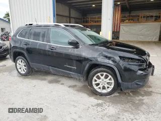 2018 Jeep Cherokee Latitude with VIN 1C4PJLCB5JD595996, listed as a Copart auction lot 57868775 with 135,431 mi miles and Salvage title. Bid and sale history available at DreamBid. Image 4.