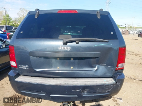 2007 Jeep Grand Cherokee Laredo with VIN 1J8GR48K77C582875, listed as a IAAI auction lot 42061653 with 259,767 mi miles. Bid and sale history available at carsss.com. Image 16.