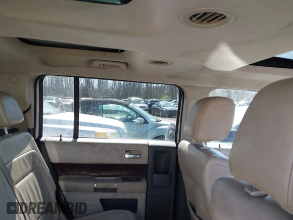 2009 Ford Flex SEL with VIN 2FMEK62C79BA09120, listed as a IAAI auction lot 41608160 with 228,977 mi miles. Bid and sale history available at carsss.com. Image 8.