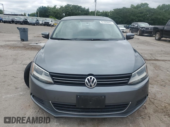 2014 Volkswagen Jetta TDI w/Premium/Nav z VIN 3VWLL7AJ1EM430822, wystawiony jako Copart lot #57405845 z przebiegiem 112 178 mil mil oraz Szkoda całkowita • Salvage title. Historia ofert i sprzedaży dostępna na DreamBid. Obrazek 5.