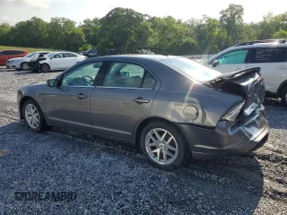 2012 Ford Fusion SEL with VIN 3FAHP0JA7CR387288, listed as a Copart auction lot 56968885 with 169,802 mi miles and Salvage title. Bid and sale history available at DreamBid. Image 2.