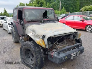 2012 Jeep Wrangler Sport with VIN 1C4AJWAG9CL203018, listed as a IAAI auction lot 42377899 with Not provided miles and . Bid and sale history available at DreamBid. Image 6.