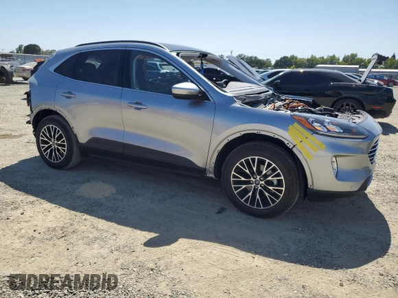 2022 Ford Escape Titanium Plug-In Hybrid with VIN 1FMCU0LZ5NUB74296, listed as a Copart auction lot 61629035 with Not provided miles and Salvage title. Bid and sale history available at DreamBid. Image 4.