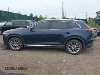 2018 Mazda CX-9 Grand Touring with VIN JM3TCBDY8J0209737, listed as a IAAI auction lot 42374826 with Not provided miles and . Bid and sale history available at DreamBid. Image 13.
