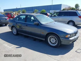 2000 BMW 5 Series 528iA with VIN WBADM634XYGU07427, listed as a IAAI auction lot 42085048 with 192,828 mi miles. Bid and sale history available at carsss.com. Image 1.