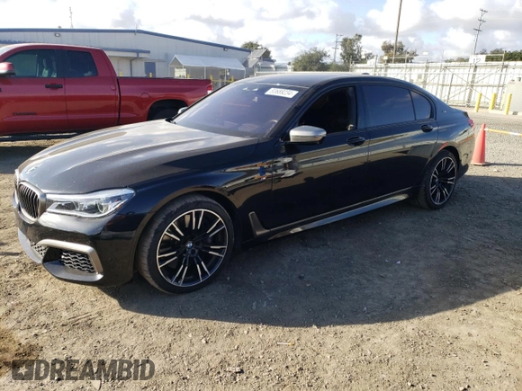 2018 BMW 7 Series M760i xDrive with VIN WBA7H6C50JG614781, listed as a Copart auction lot 83689234 with 49,873 mi miles and Salvage Title. Bid and sale history available at carsss.com. Image 1.